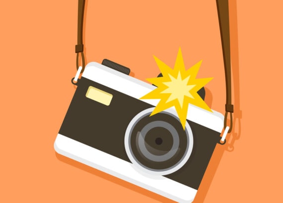 Illustration d’un appareil photo avec flash intégré en train de se déclencher