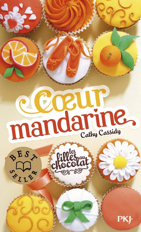 Couverture du livre Cœur mandarine de Cathy Cassidy, tome 3 de la série Les filles au chocolat, avec des cupcakes décorés aux couleurs orange et mandarine.